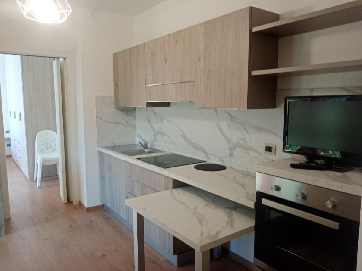 Appartamento Prima Rosa Primaluna Bagian luar foto